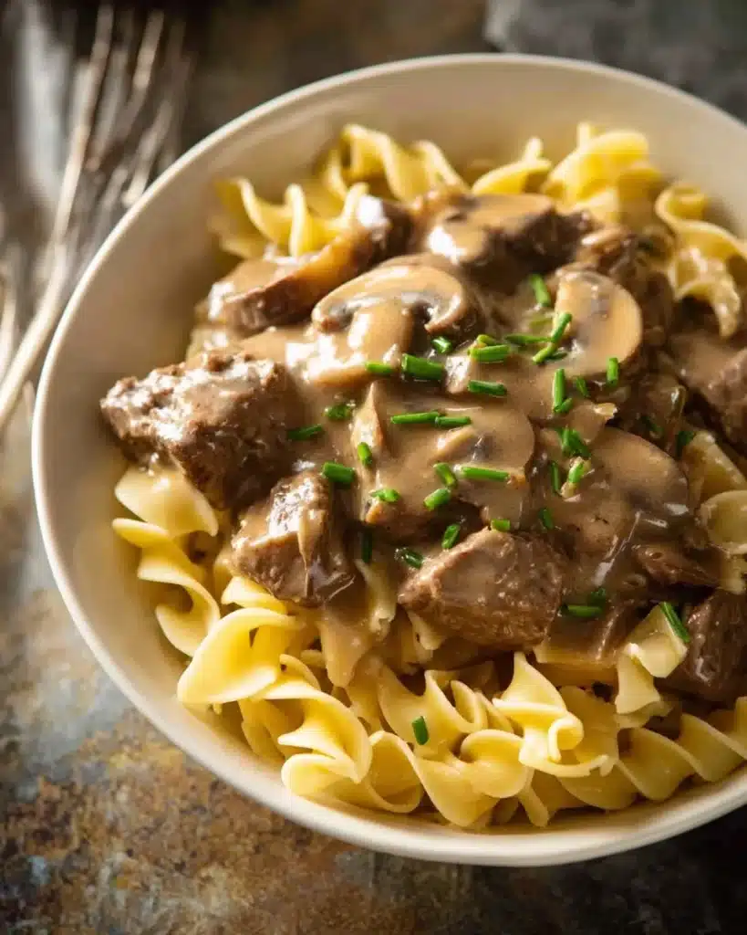 Delicious serving of homemade Beef Stroganoff with mushrooms and noodles