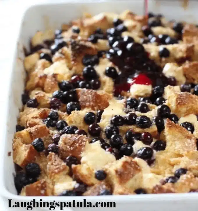 Blueberry Sunrise French Toast Bake served with fresh blueberries and syrup