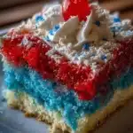 patriotic red white and blue poke cake 2026 05 18 141730 771x1024 1