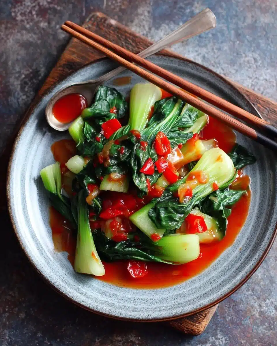 Stir-Fried Bok Choy with Ginger-Chili Sauce served in a colorful dish